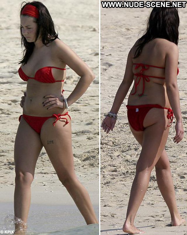 Chubby beach brunette topless